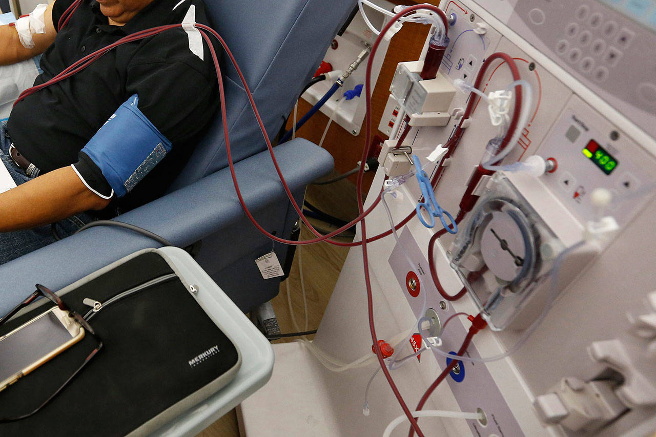 A patient undergoes dialysis at a clinic in Sacramento, California, on Sept. 24. Results of a study released Sunday show that the diabetes drug Invokana has been shown to help prevent or delay worsening of kidney disease, which causes millions of deaths each year and requires hundreds of thousands of people to use dialysis to stay alive. (AP Photo/Rich Pedroncelli)