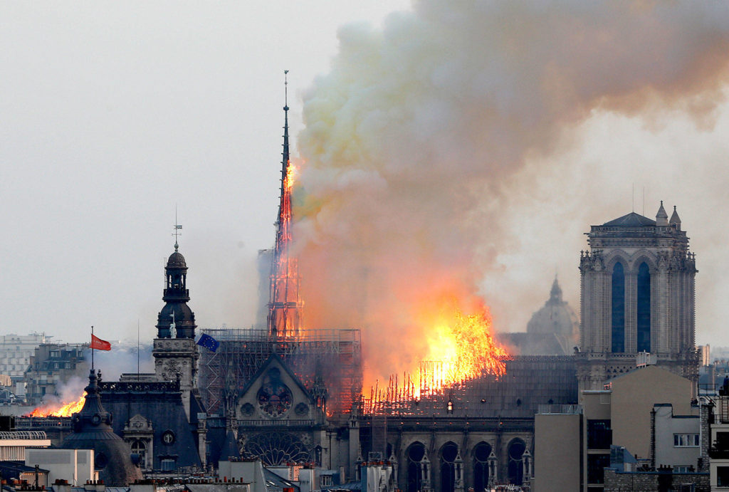 Thibault Camus / Associated Press
Flames rise from Notre Dame cathedral as it burns in Paris on Monday.
