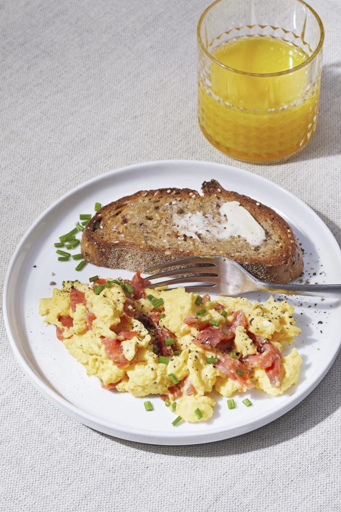 Upgrade your scrambled eggs by folding in chopped smoked salmon at the end of cooking, just as the eggs are about set. (Photo by Tom McCorkle for The Washington Post)

