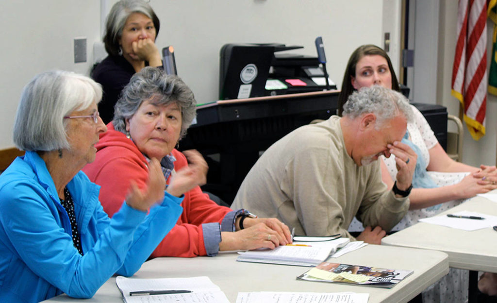 South Whidbey School District board chairwoman Linda Racicot (left) addresses the crowd at Wednesday’s community forum. Other board members are Julie Hadden, Damian Greene and Andrea Downs (far right). (Patricia Guthrie / Whidbey News Group)
