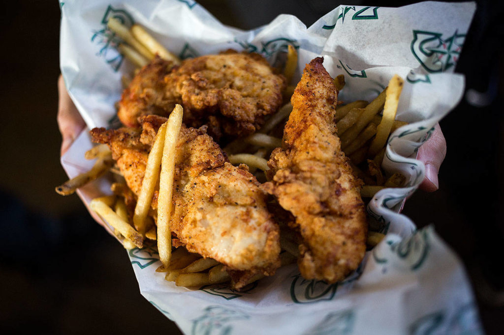 New to the ballpark this year are chicken strips and fries from Fat’s Chicken in Seattle’s Central Area. (Andy Bronson / The Herald)
