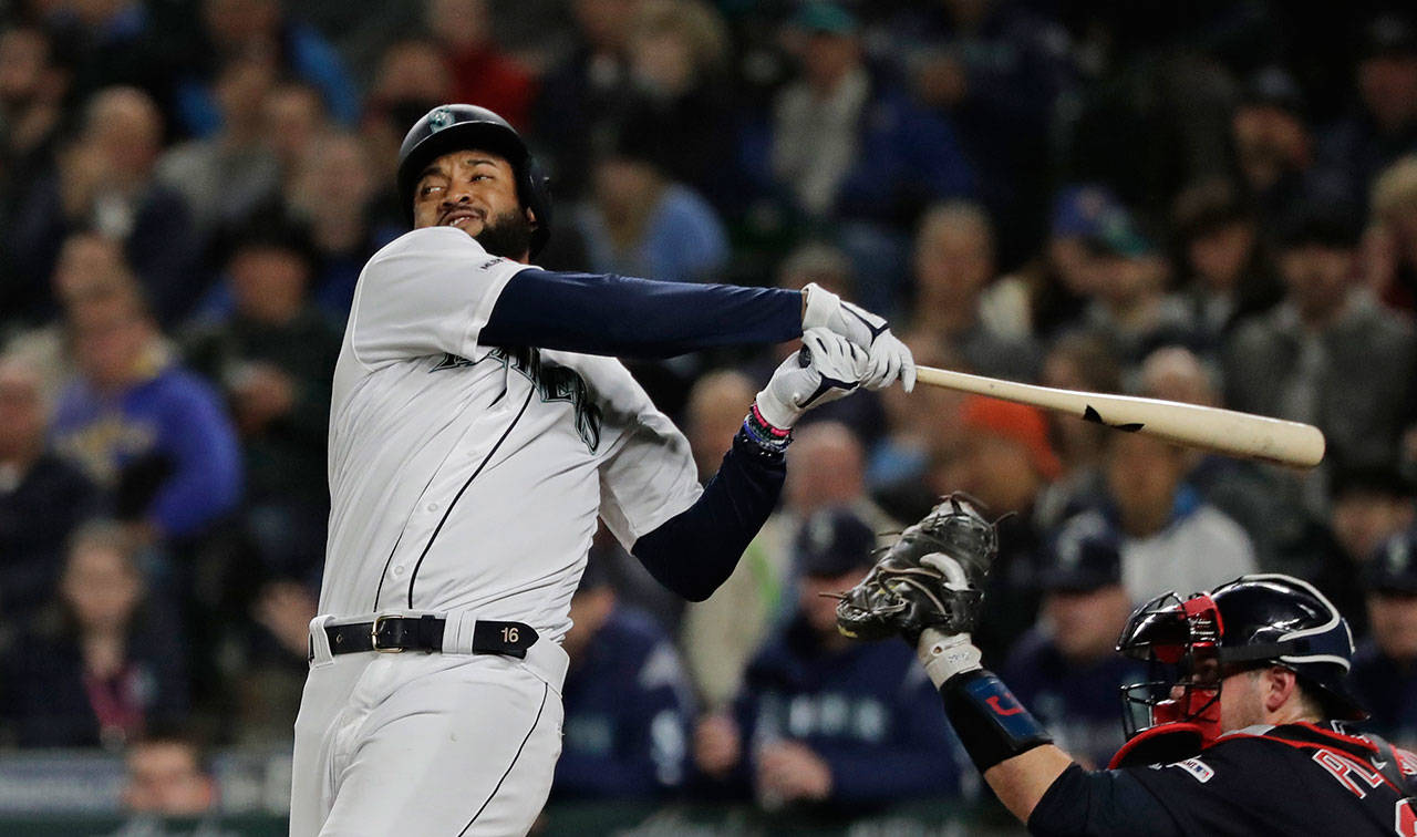 The Mariners’ Domingo Santana strikes out swinging during the third inning of a game against the Indians on April 16, 2019, in Seattle. (AP Photo/Ted S. Warren)