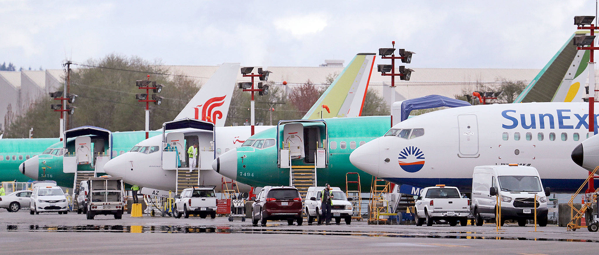 Boeing 737 MAX airplanes are parked near the Boeing Co. production facility in Renton. (AP Photo/Elaine Thompson, File)