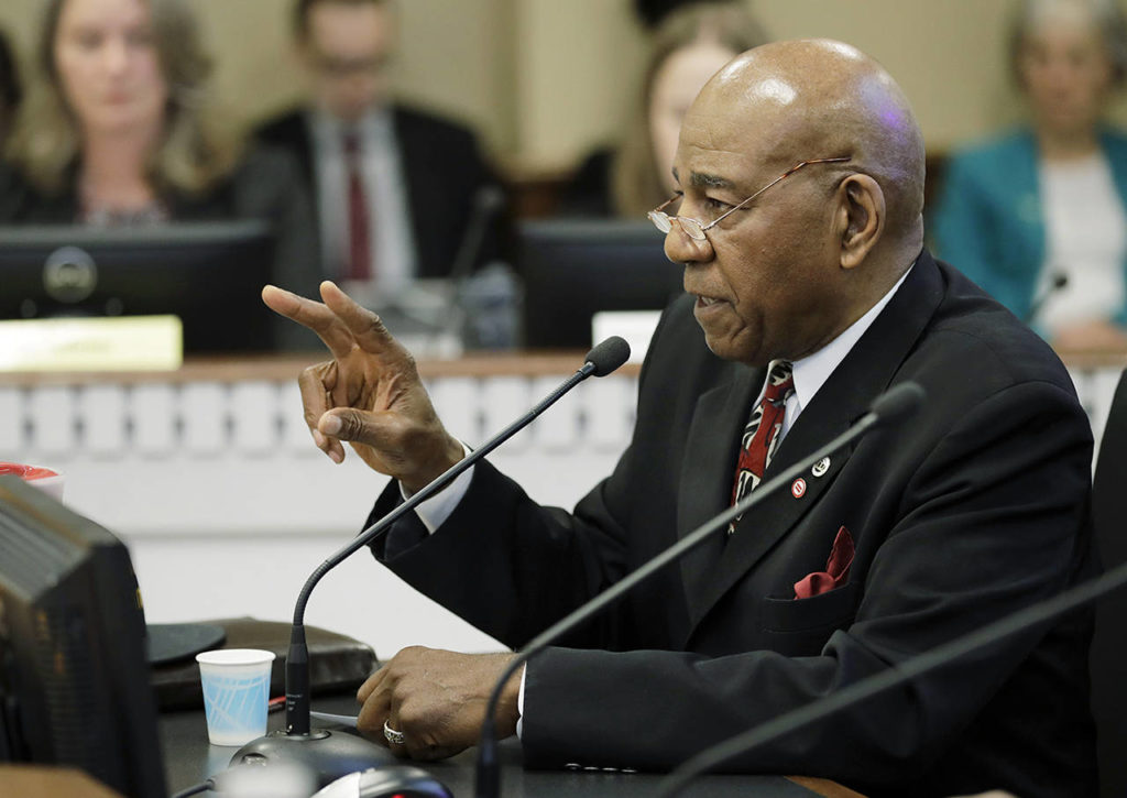 Nat Jackson, the citizen sponsor of Initiative 1000, speaks during a hearing before a joint Washington state House and Senate committee Thursday at the Capitol in Olympia. (AP Photo/Ted S. Warren)

