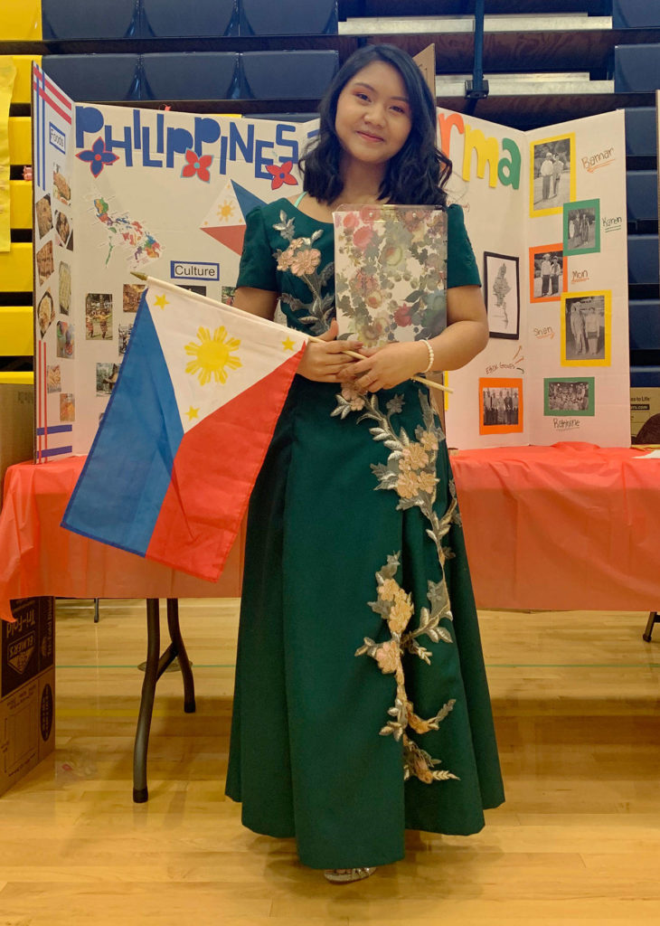 Kimberly Placido at cultural night wearing a dress decorated in traditional Filipino style. (Kimberly Placido)
