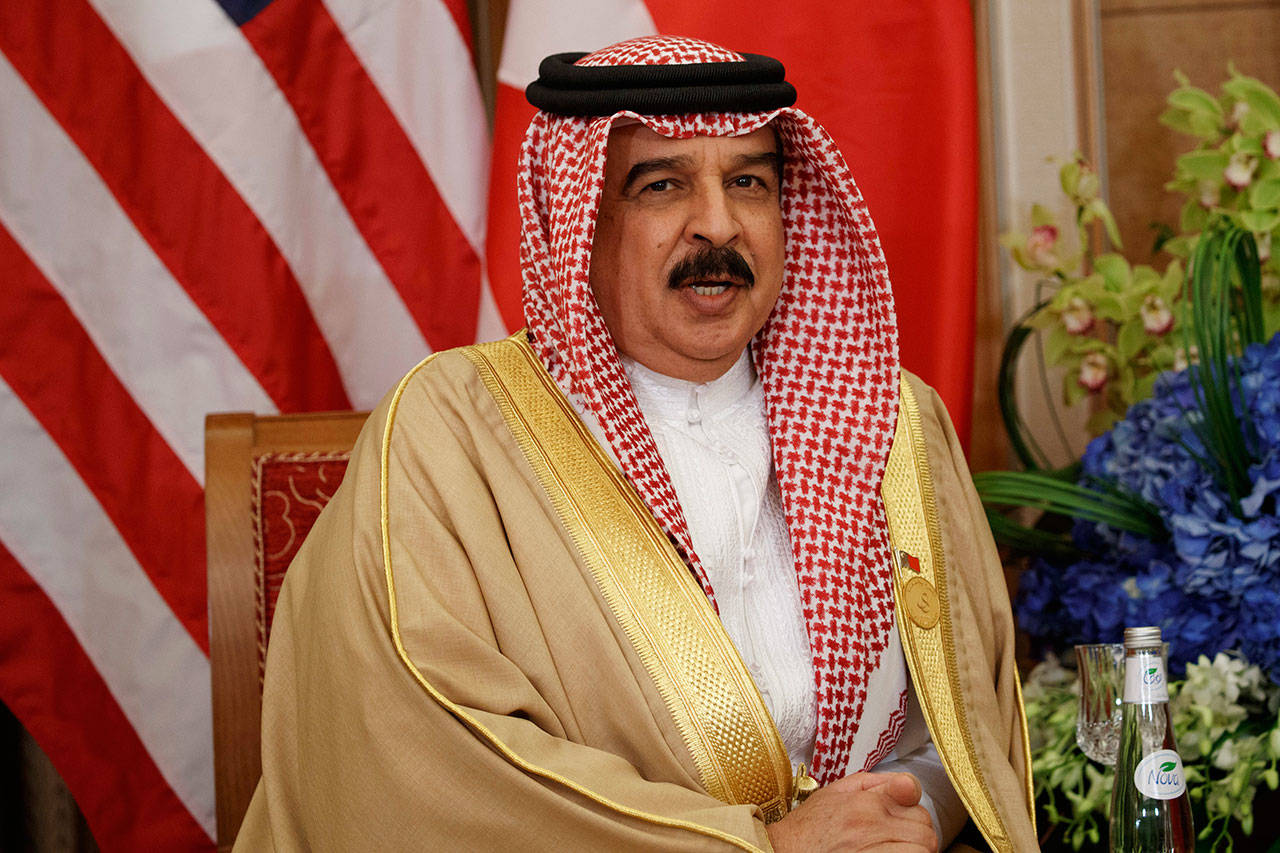Bahrain’s King Hamad bin Isa Al Khalifa speaks during a meeting with U.S. President Donald Trump, in Riyadh, Saudi Arabia, on May 21, 2017. The king reinstated the citizenship of 551 people convicted amid a crackdown on dissent on the island. The surprise royal decree, announced Sunday by the state-run Bahrain News Agency, gave no explanation for his decision. (AP Photo/Evan Vucci, File)
