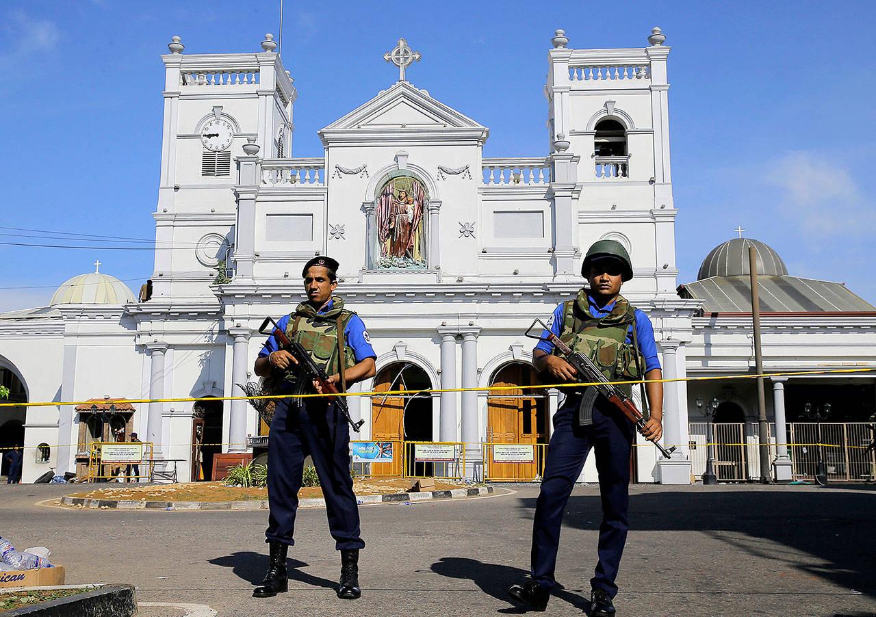 Sri Lankan Navy soldiers stand guard in front of the St. Anthony’s Shrine a day after the series of blasts, in Colombo, Sri Lanka, on Monday. (AP Photo/Eranga Jayawardena)