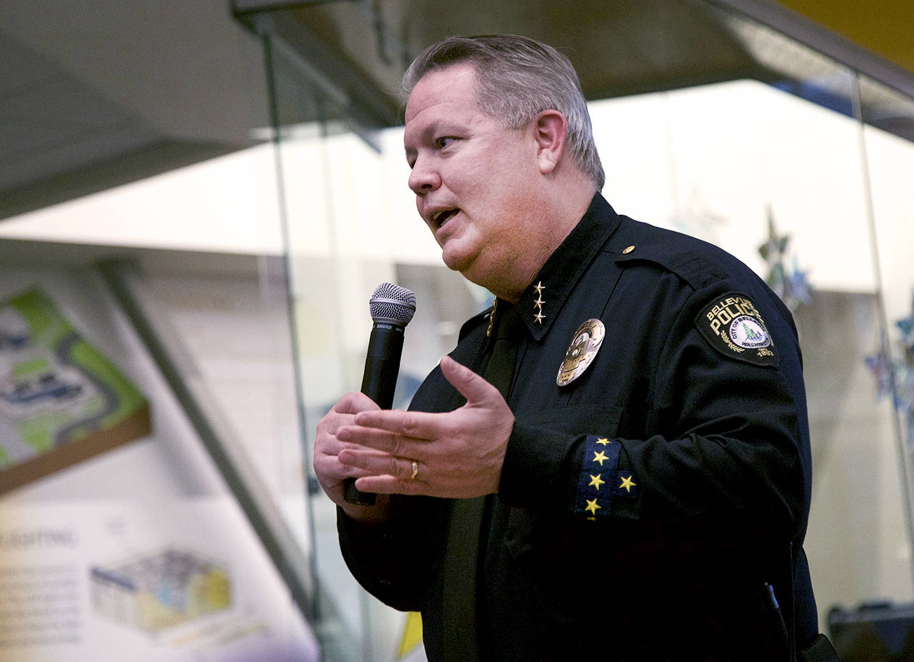 Bellevue Police Chief Steve Mylett speaks during a town hall meeting on April 10. He believes a rise of violent acts in the Crossroads area is gang related. (Ashley Hiruko / Bellevue Reporter)