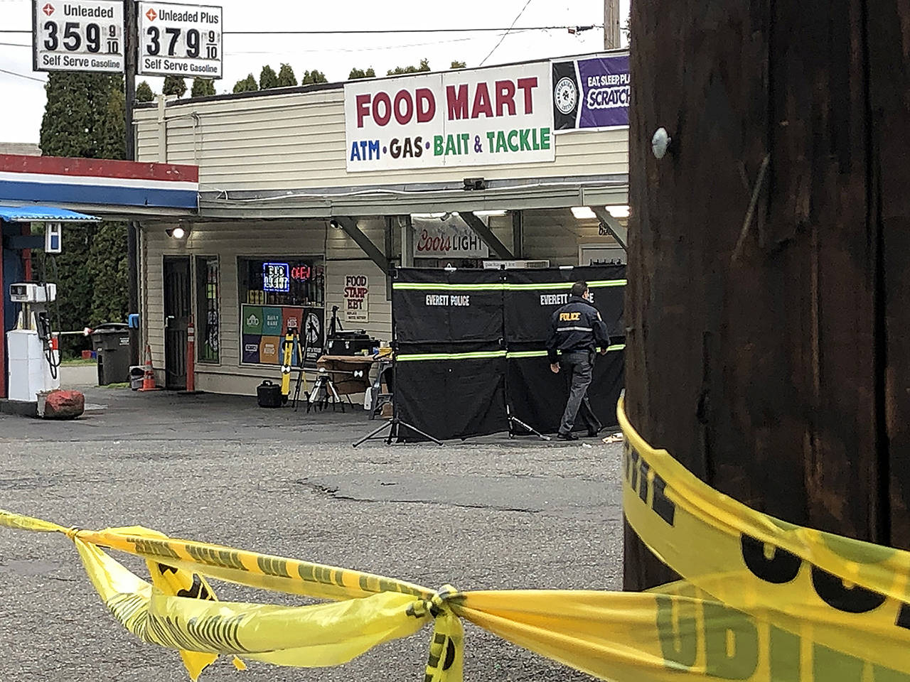 An employee of an Everett convenience store was stabbed to death late Monday in the 6900 block of Broadway. (Caleb Hutton / The Herald)