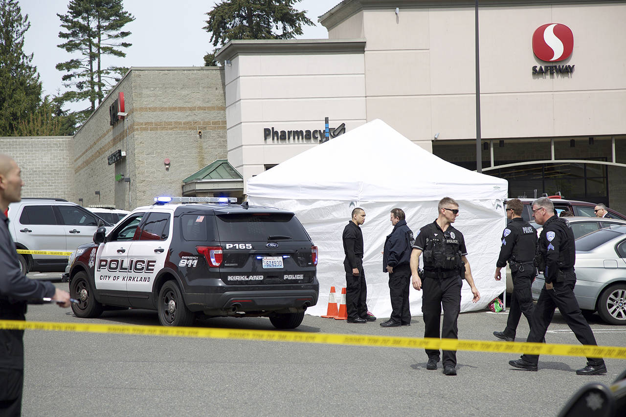 Kirkland investigators had portions of the Juanita neighborhood Safeway parking lot blocked off on Thursday, after a child was hit and killed. (Ashley Hiruko / Kirkland Reporter)