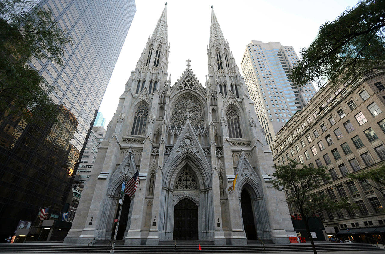 The newly renovated and cleaned facade of St. Patrick’s Cathedral in New York on Aug. 30, 2015. The Archdiocese of New York says at least 120 priests accused of sexually abusing a child or having child pornography have worked there over decades. The nation’s second-largest archdiocese released a list of names on Friday. (AP Photo/Mary Altaffer, File)