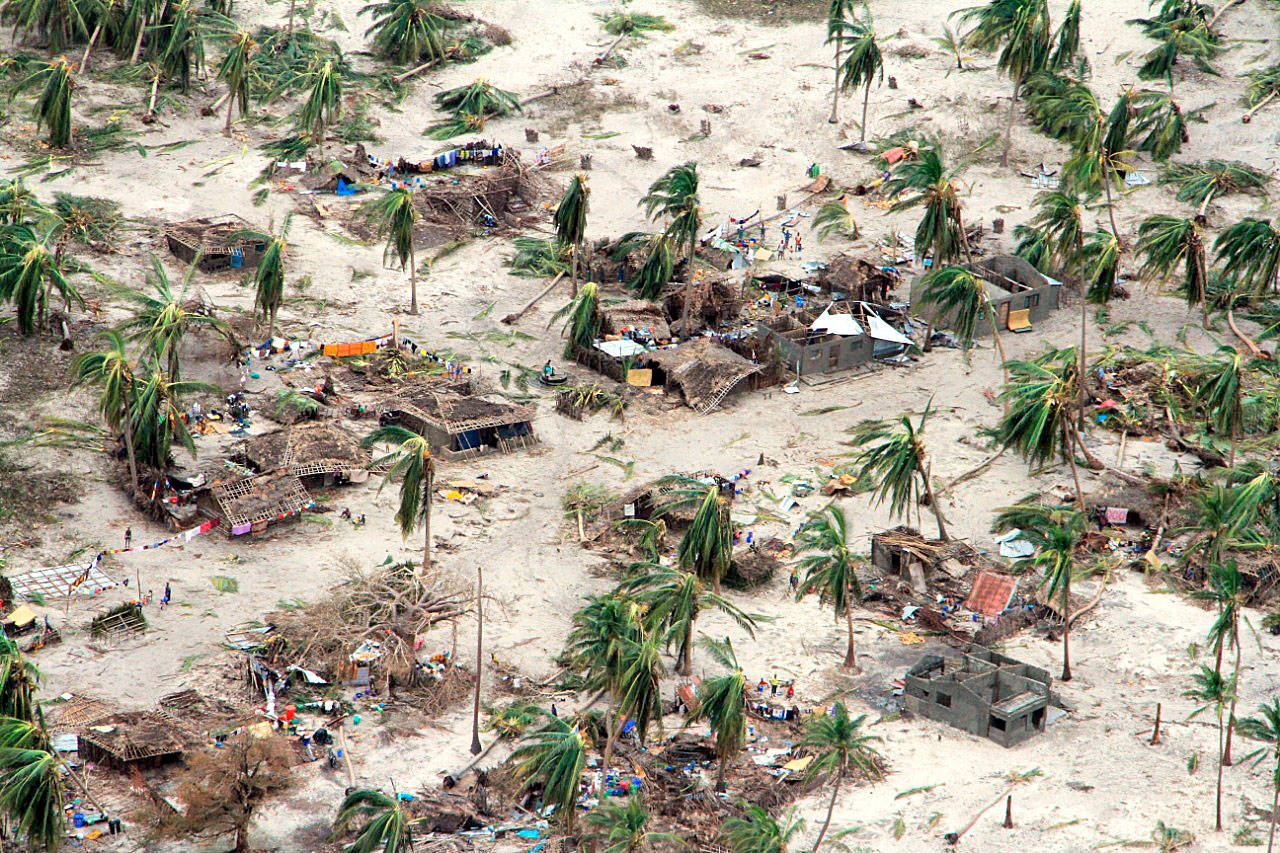 In this photo provided by the United Nations Office for the Coordination of Humanitarian Affairs, badly damaged communities are seen from an aerial view, in Macomia district, Mozambique, on Saturday. Authorities have urged many residents to seek higher ground in the wake of Cyclone Kenneth as rain lashes the region. (Saviano Abreu/OCHA via AP)