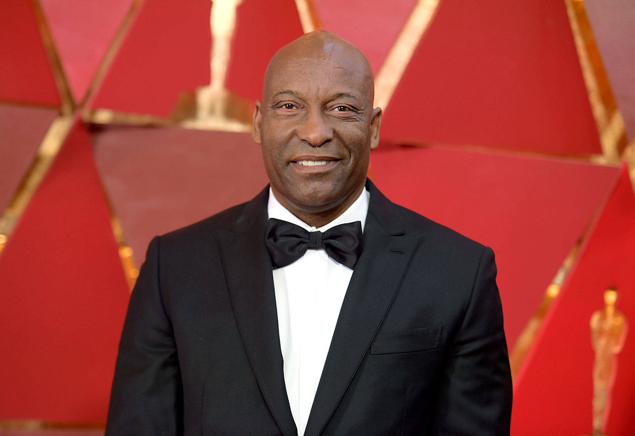 John Singleton at the Oscars in Los Angeles on March 4, 2018. (Photo by Richard Shotwell/Invision/AP, File)