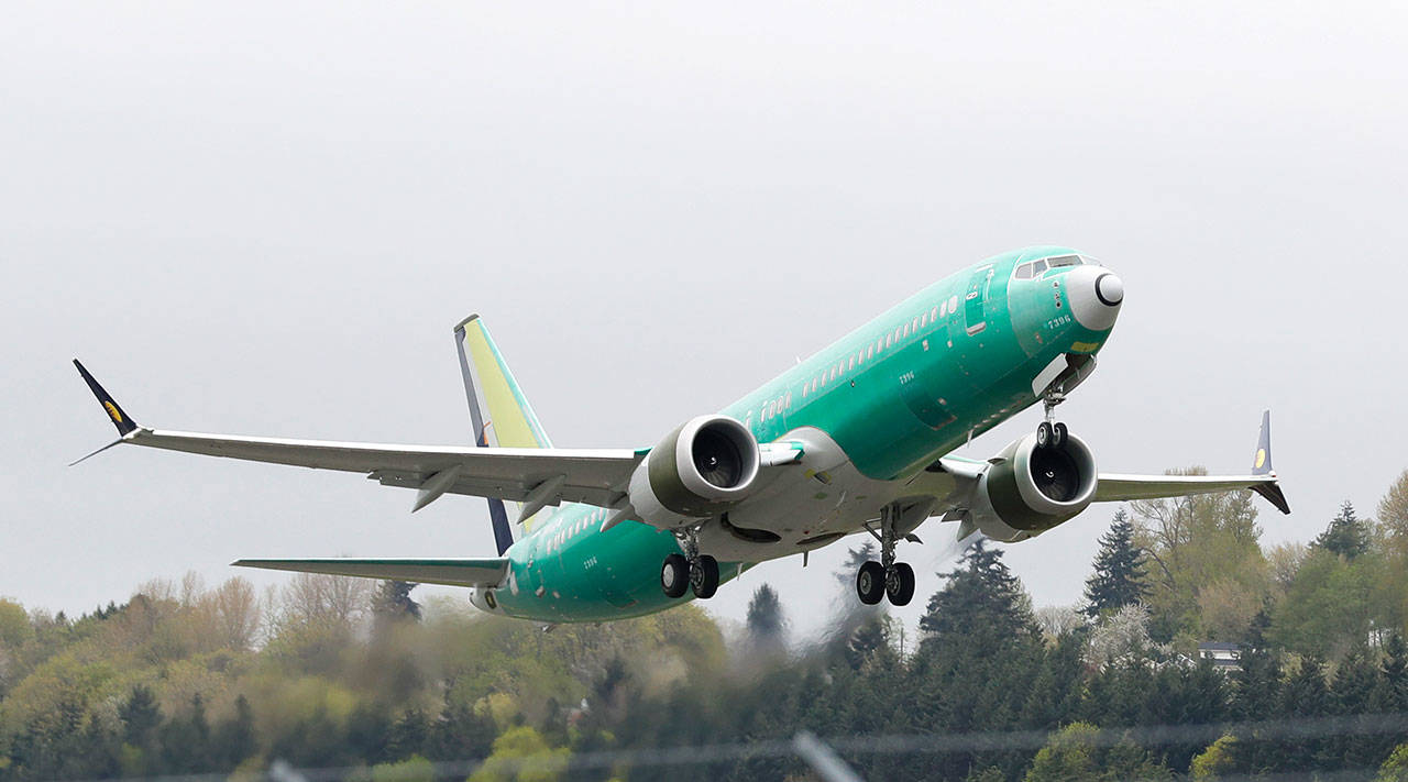 A Boeing 737 MAX 8 airplane, built for India-based Jet Airways, takes off on a test flight at Boeing Field in Seattle April 10. (AP Photo/Ted S. Warren, File)