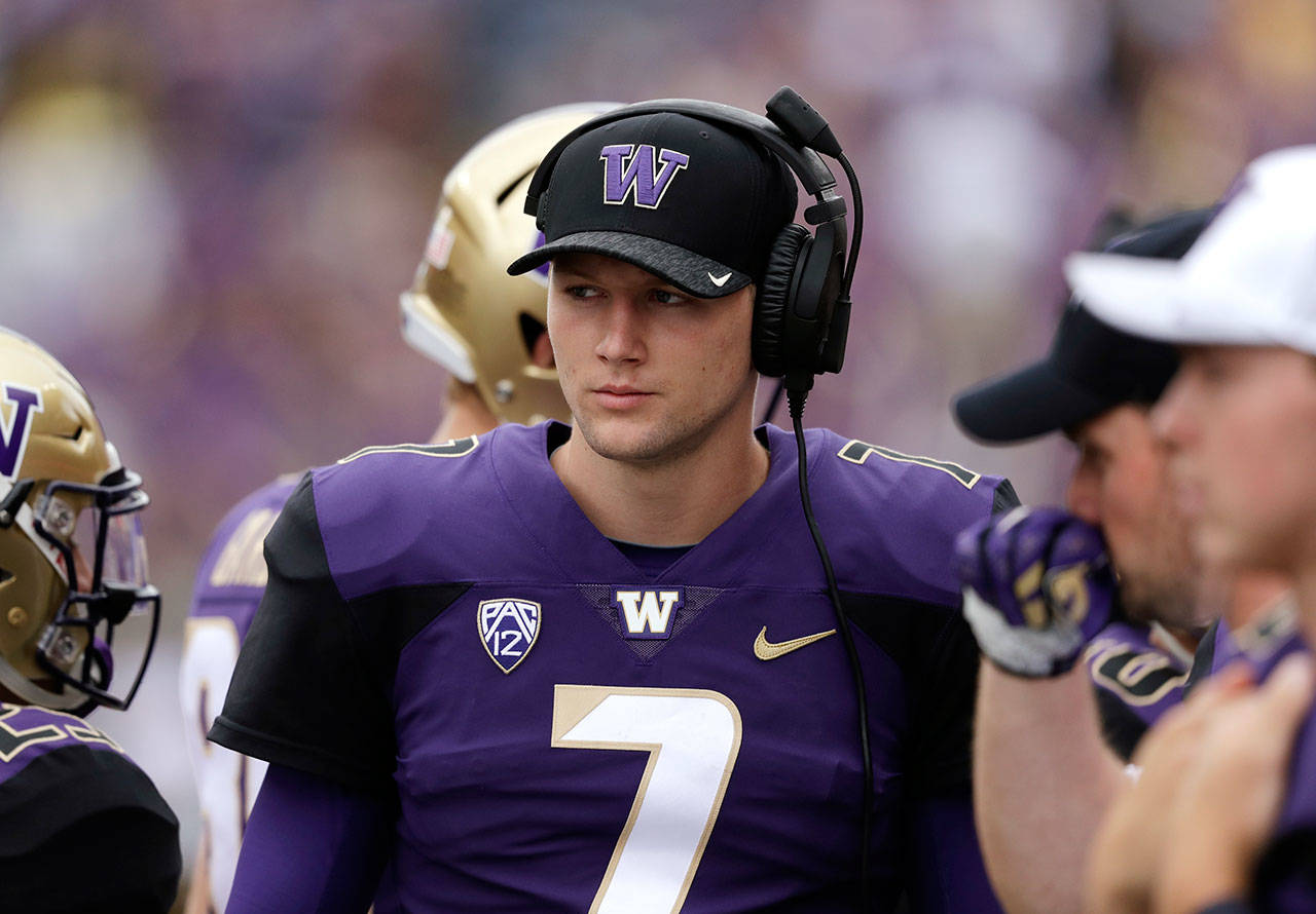 Washington quarterback Colson Yankoff stands on the sideline during a game against North Dakota on Sept. 8, 2018, in Seattle. (AP Photo/Elaine Thompson)
