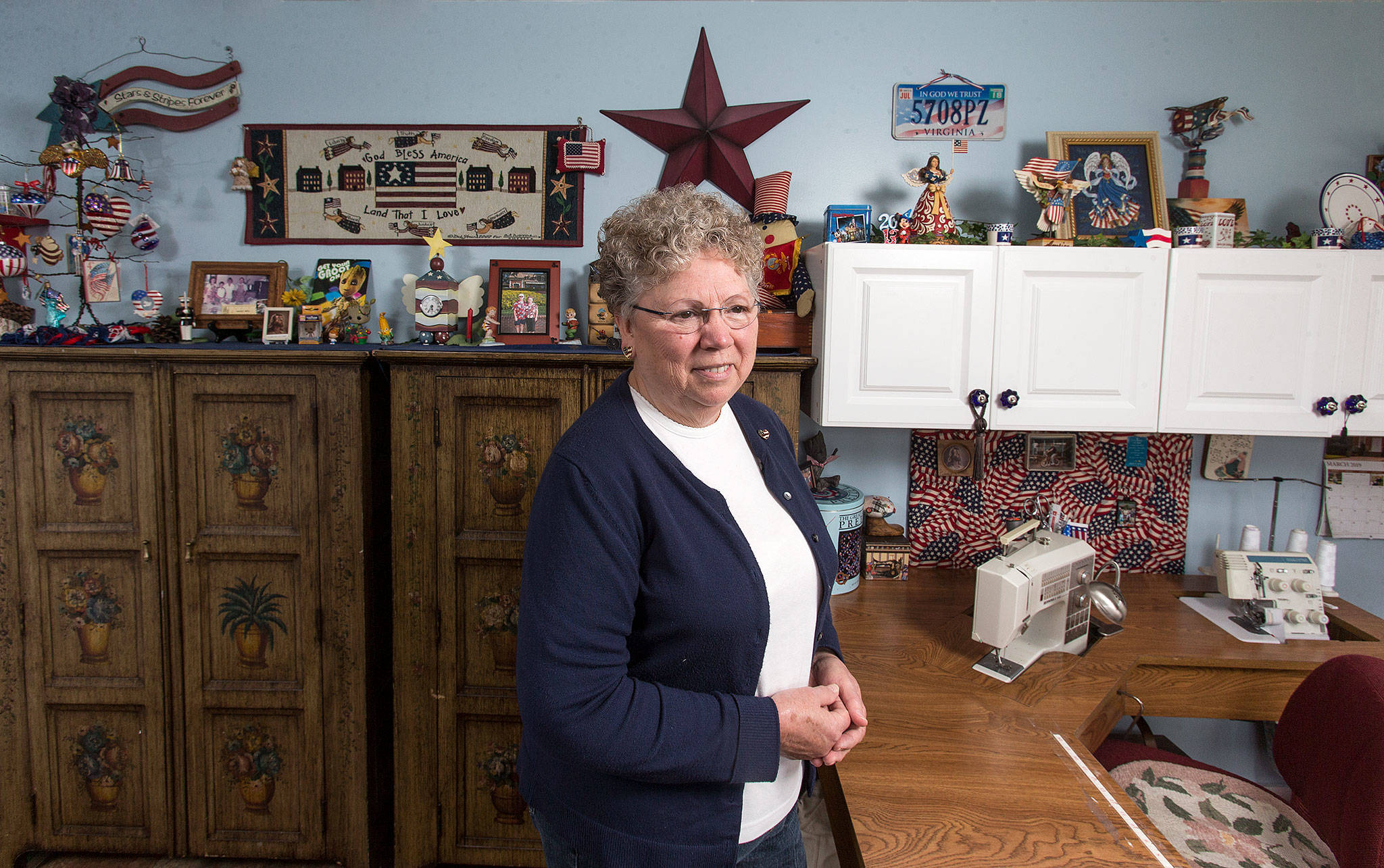 Everett resident Cheryl Olsen began collecting patriotic decorations in the early 1980s. (Andy Bronson / The Herald)