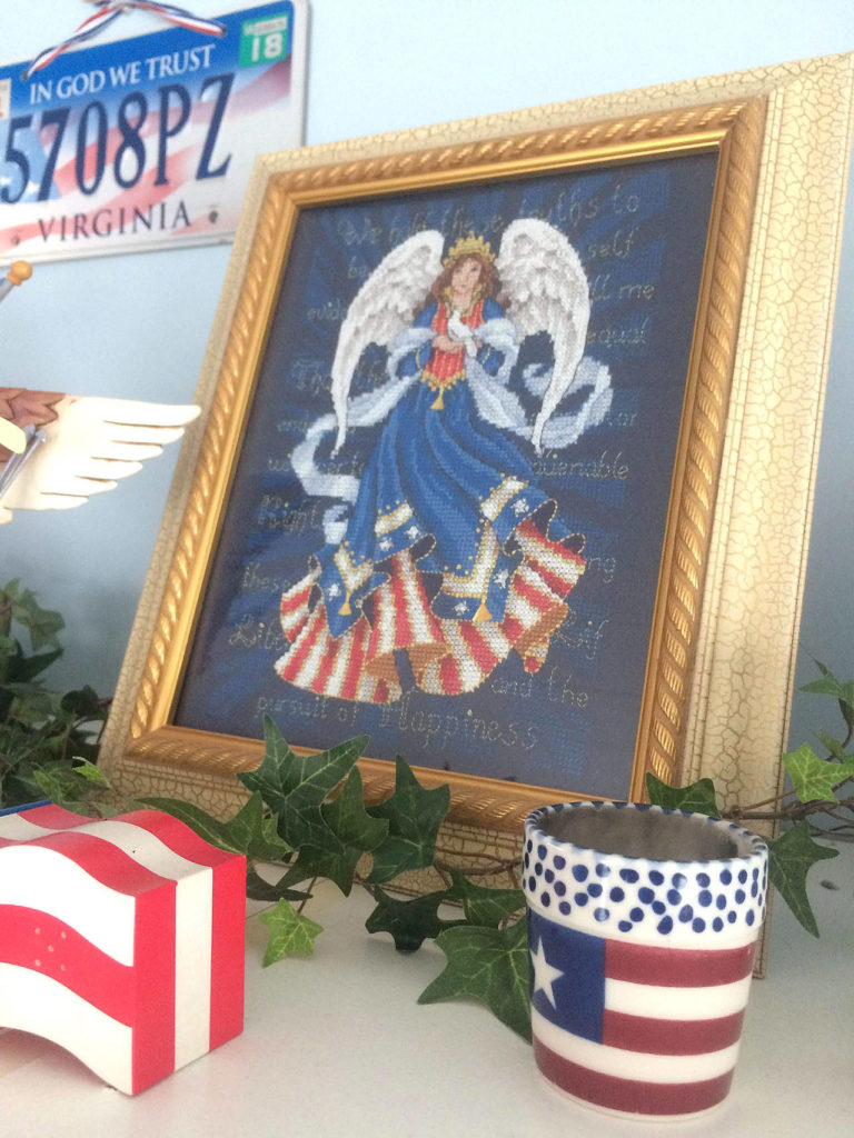 Cheryl Olsen’s daughter-in-law made this cross-stitching of an Americana angel for her sewing room. (Evan Thompson / The Herald)
