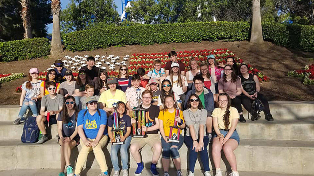Everett High School Wind Ensemble and Jazz Band with their trophy. (Everett High School)
