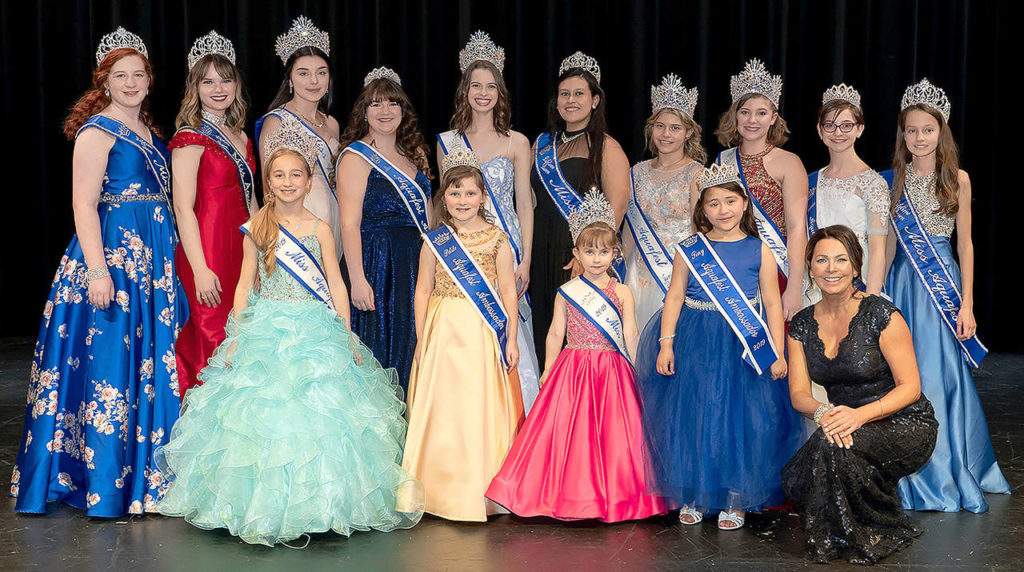 The 2019 Lake Stevens Miss Aquafest Pageant royalty. Back row, left to right: Lifetime Queen Ellie Behn, Lifetime Queen Hannah Krutsinger, Teen Queen Amberlynn Kiepe, Miss Ambassador Cassie Kunselman, Miss Aquafest Kayla Kalin, Lifetime Queen Natalia Lagunas, Junior Queen Natalie Trujillo, Community Service Queen Dakotah Richards, Junior Ambassador Isabeau Prettyman and Lifetime Queen Audrey Barlow. Front row, left to right: Petite Queen Isabelle Garrett, Petite Ambassador Claira Duncil, Tiny Queen Lilah Duncil, Tiny Ambassador Emma-Juliet Zavalza and Mistress of Ceremonies Janice Huxford. Not present: Teen Ambassador Eva Castleberry. (Submitted photo)
