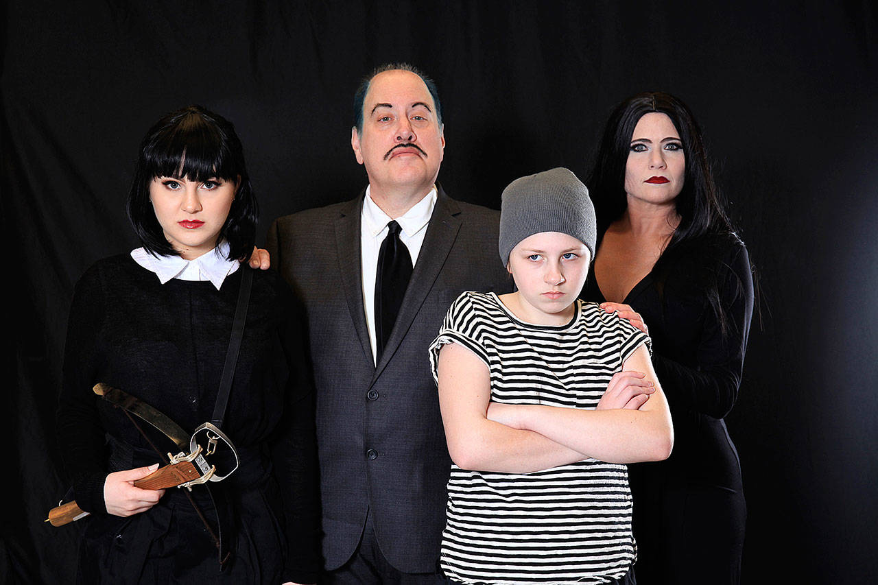 “The Addams Family,” produced by the Edmonds Driftwood Players, is staging April 12 to May 5 at the Wade James Theater. From left to right: Megan Acuna, Doug Knoop, Catherine Craig and Tamara Davis. (Dale Sutton of Magic Photo)