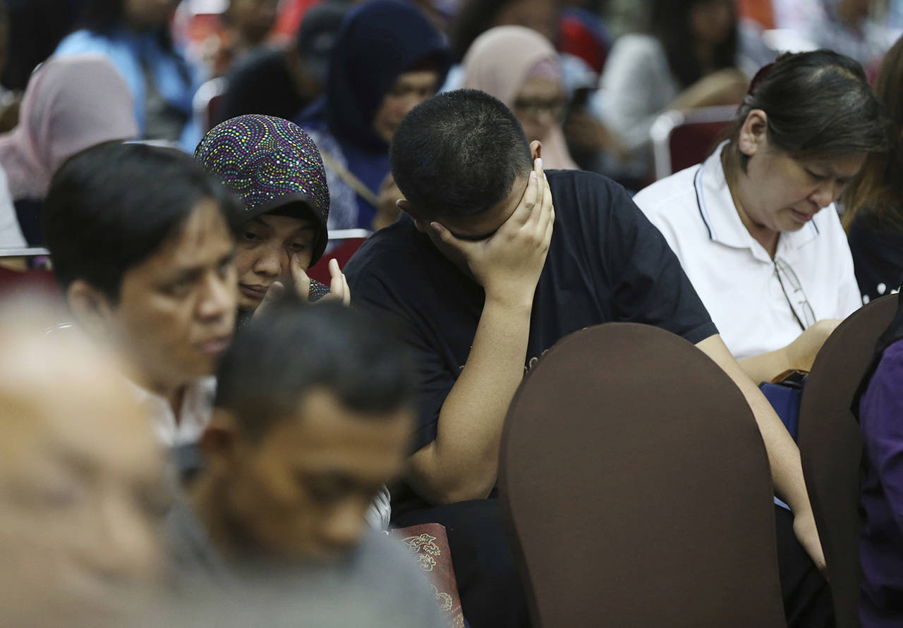 Relatives of victims in the Lion Air jet that crashed into the Java Sea are shown during a press conference in Jakarta, Indonesia, on Nov. 5, 2018. (AP Photo/Achmad Ibrahim, file)