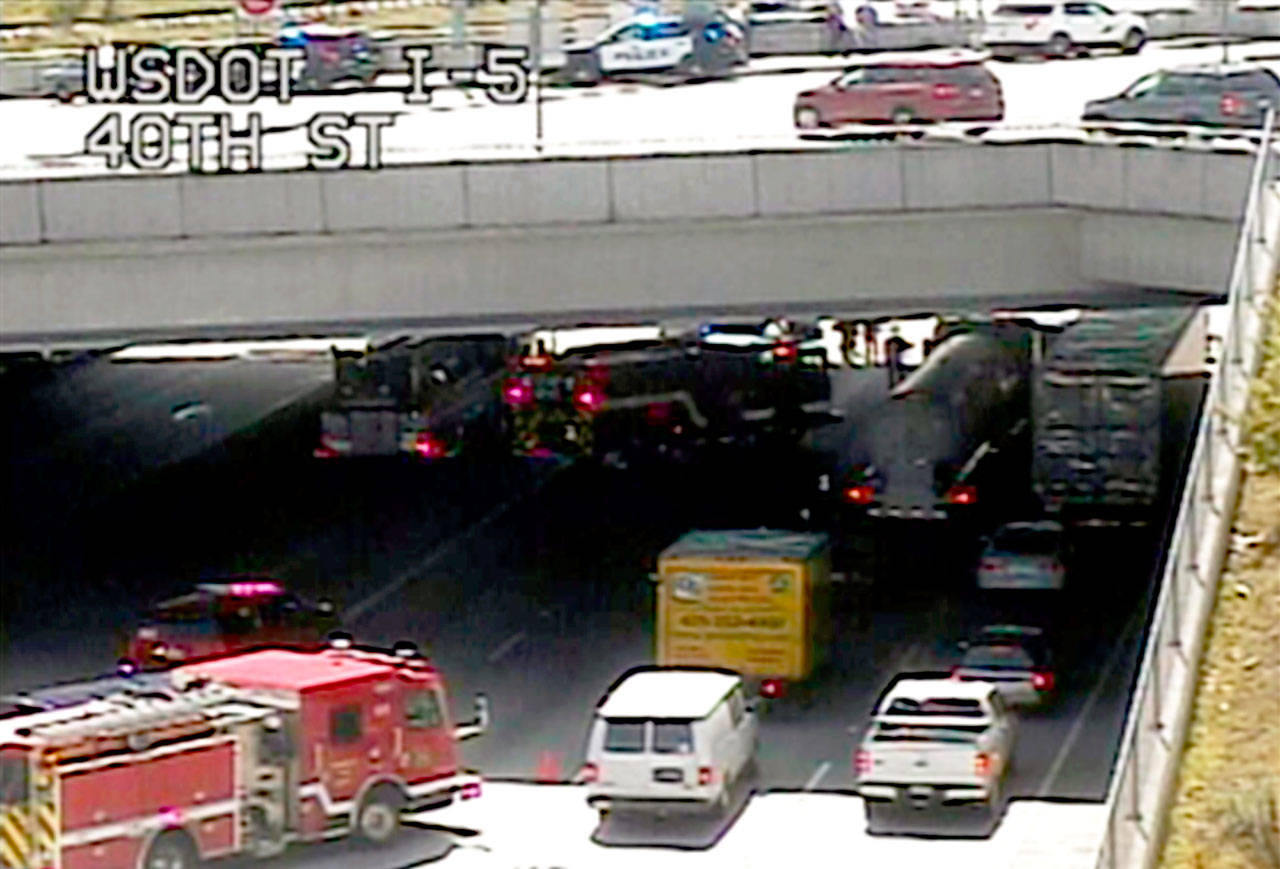 The scene at 12:42 p.m. Wednesday under the 41st Street bridge over southbound I-5 in Everett, where a person reportedly jumped into freeway traffic. (Washington State Department of Transportation)