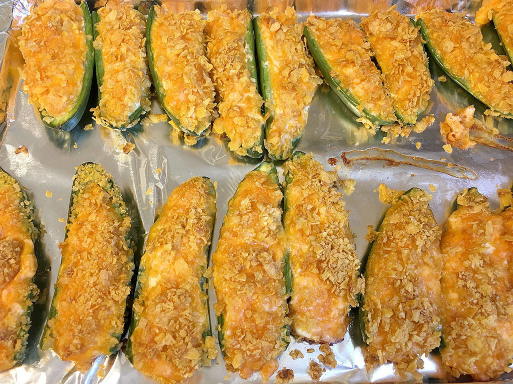 Stuffed green peppers, like these from InnAtTheCrossroads.com, a recipe site that turns the fictional dishes of the “A Song of Ice & Fire” book series and “Game of Thrones” HBO show into reality, punch up the heat index on a table spread. (Ben Watanabe / The Herald)
