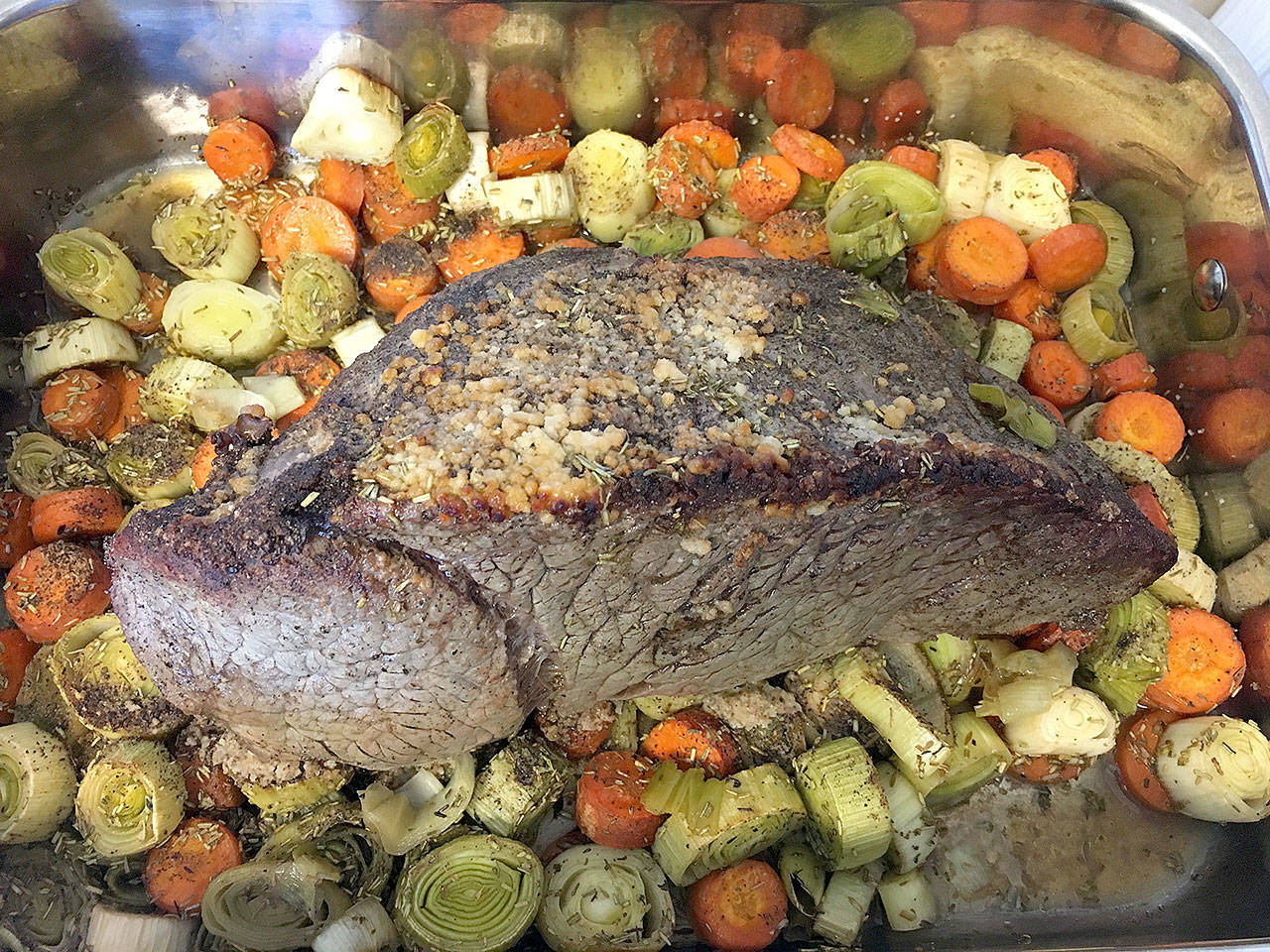 A meal fit for the King in the North or the Dragon Queen, roast aurochs with carrots and leeks is a hearty dish from the cookbook, “A Feast of Ice & Fire: The Official Companion Cookbook” to the HBO show “Game of Thrones.” (Ben Watanabe / The Herald)
