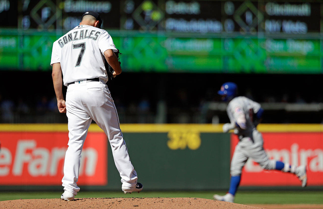 Mariners starting pitcher Marco Gonzales (7) waits for the Cubs’ Javier Baez to round the bases after hitting a solo home run in the second inning of a game on May 1, 2019, in Seattle. (AP Photo/Elaine Thompson)