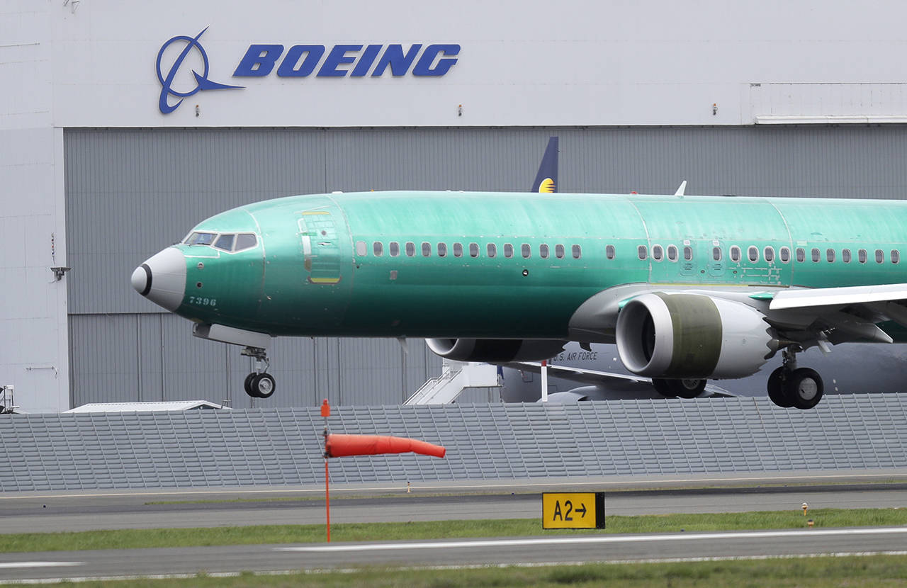 In this April 10 photo, a Boeing 737 MAX 8 airplane being built for India-based Jet Airways lands following a test flight at Boeing Field in Seattle. (AP Photo/Ted S. Warren, File)