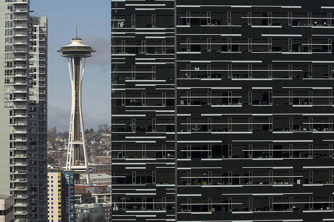 The Space Needle is stands near Amazon’s Day One building in Seattle. (David Ryder / The Washington Post)
