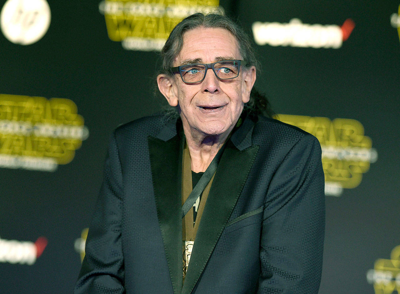 Peter Mayhew arrives at the world premiere of “Star Wars: The Force Awakens” in Los Angeles on Dec. 14, 2015. (Photo by Jordan Strauss/Invision/AP, File)