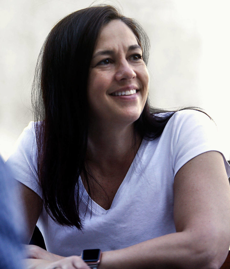 Everett’s Cathi Lee talks Wednesday with other women who lost children to overdoses. They will be part of a new chapter of GRASP, Grief Recovery After Substance Passing. (Dan Bates / The Herald)
