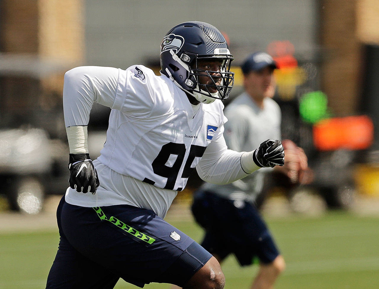 Seahawks defensive end L.J. Collier runs a drill during rookie minicamp on May 3, 2019, in Renton. (AP Photo/Ted S. Warren)