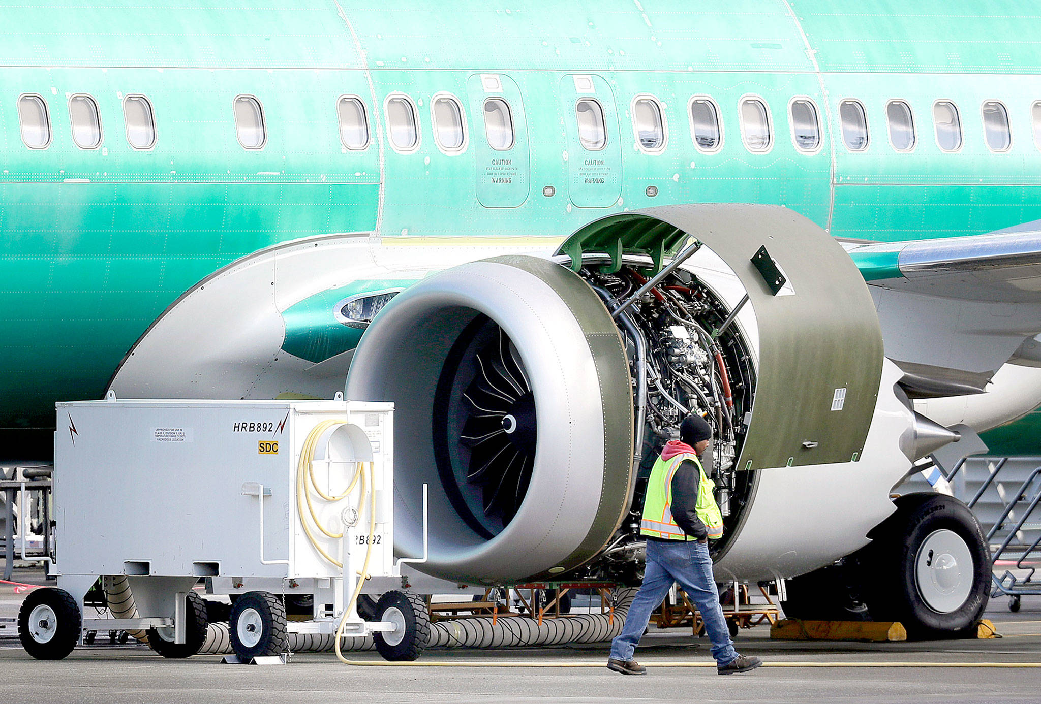 An engine on a Boeing 737 Max 8 airplane at the Boeing Co.’s Renton assembly plant on March 13. (AP Photo/Ted S. Warren, File)