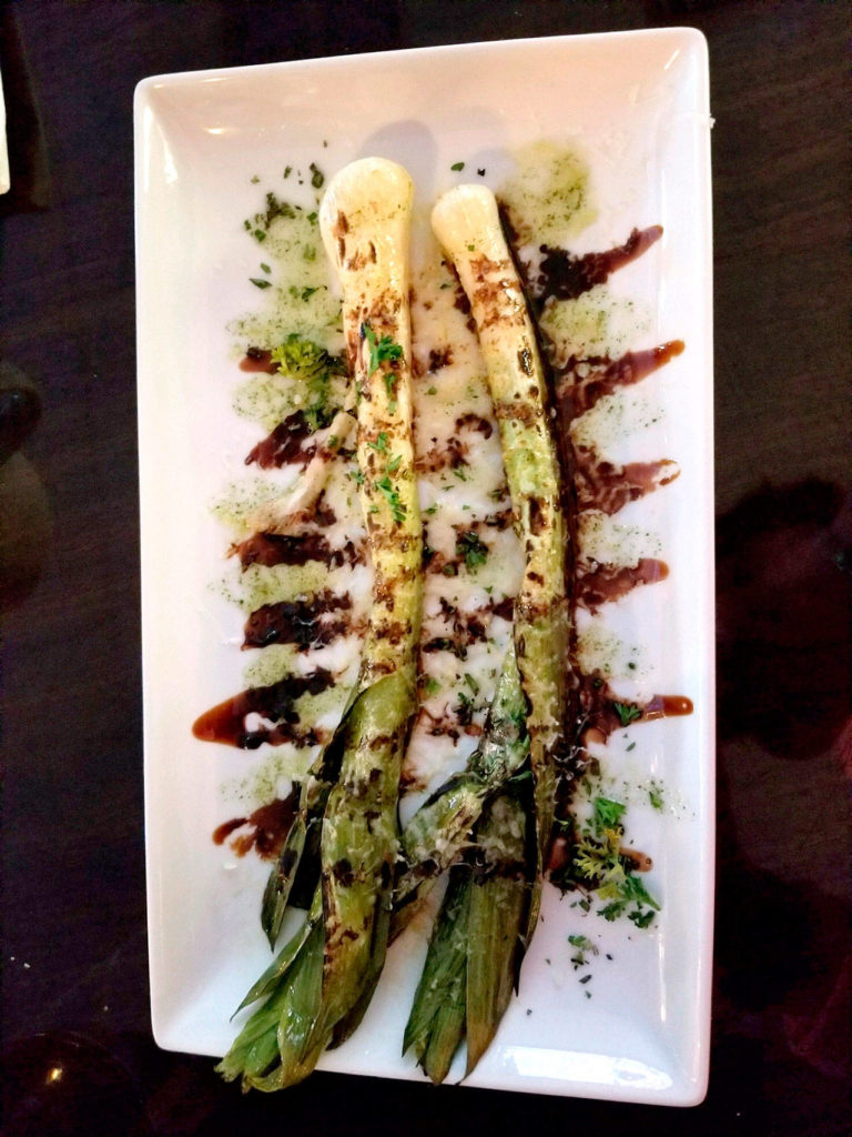 Order the braised leeks from a shared plate menu at Crow Island Farms for $14. (Pam Bruestle)
