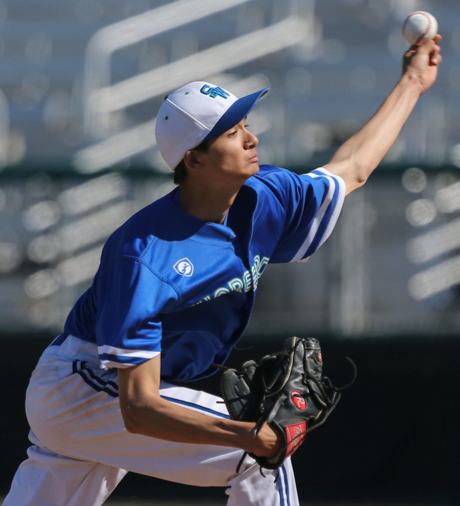 Shorewood junior Kenji Miller pitched a complete game, allowing just three hits out of the infield while limiting Arlington to just one run. (Kevin Clark / The Herald)
