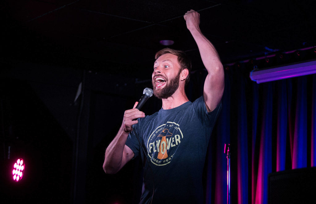 Andrew Frank gets laughs during his stand-up routine at the Comedy Garage, a weekly comedy showcase and open mic at Tony V’s Garage in Everett. Frank will be heading to Scotland in August to perform in the Edinburgh Fringe Festival. (Andy Bronson / The Herald)
