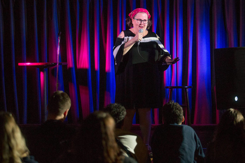 Kate Carlson Carlsen does her stand-up routine at the Comedy Garage, where she co-hosts the weekly comedy showcase. (Andy Bronson / The Herald)
