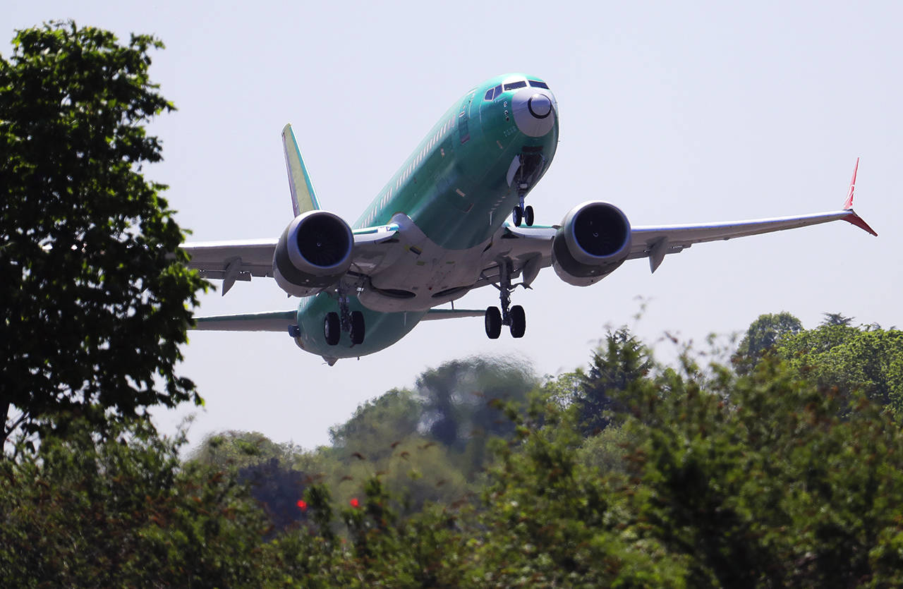 A Boeing 737 MAX 8 jetliner being built for Turkish Airlines takes off on a test flight Wednesday in Renton. (AP Photo/Ted S. Warren)