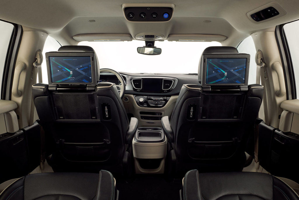 On the 2019 Chrysler Pacifica Hybrid, an optional Uconnect Theater system with wireless charging includes a DVD player with seatback video screens. (Manufacturer photo)

