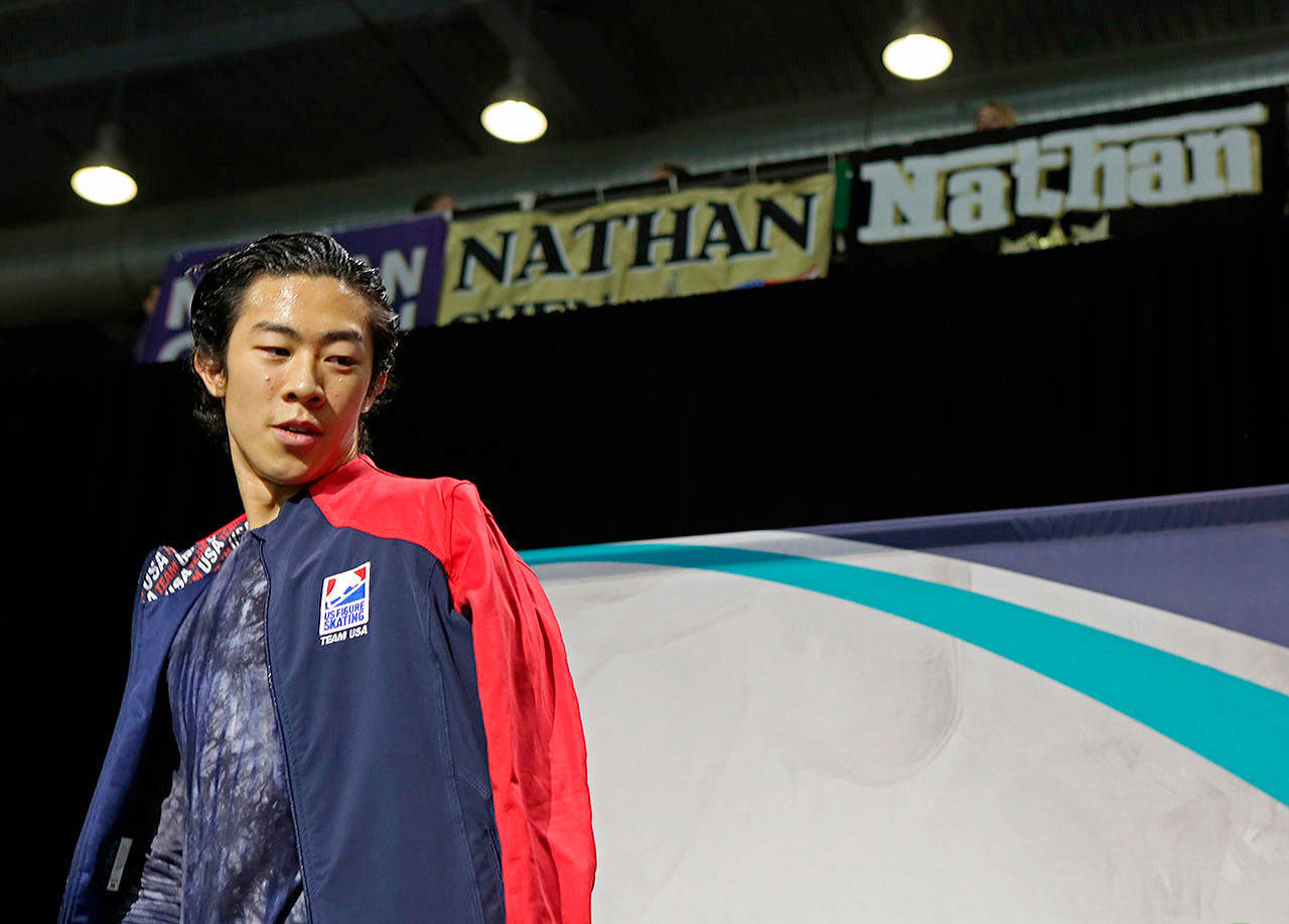 Nathan Chen leaves the media area after receiving a first-place score at the 2018 Skate America competition on October 20, 2018, at Angel of the Winds Arena in Everett. (Olivia Vanni / The Herald)