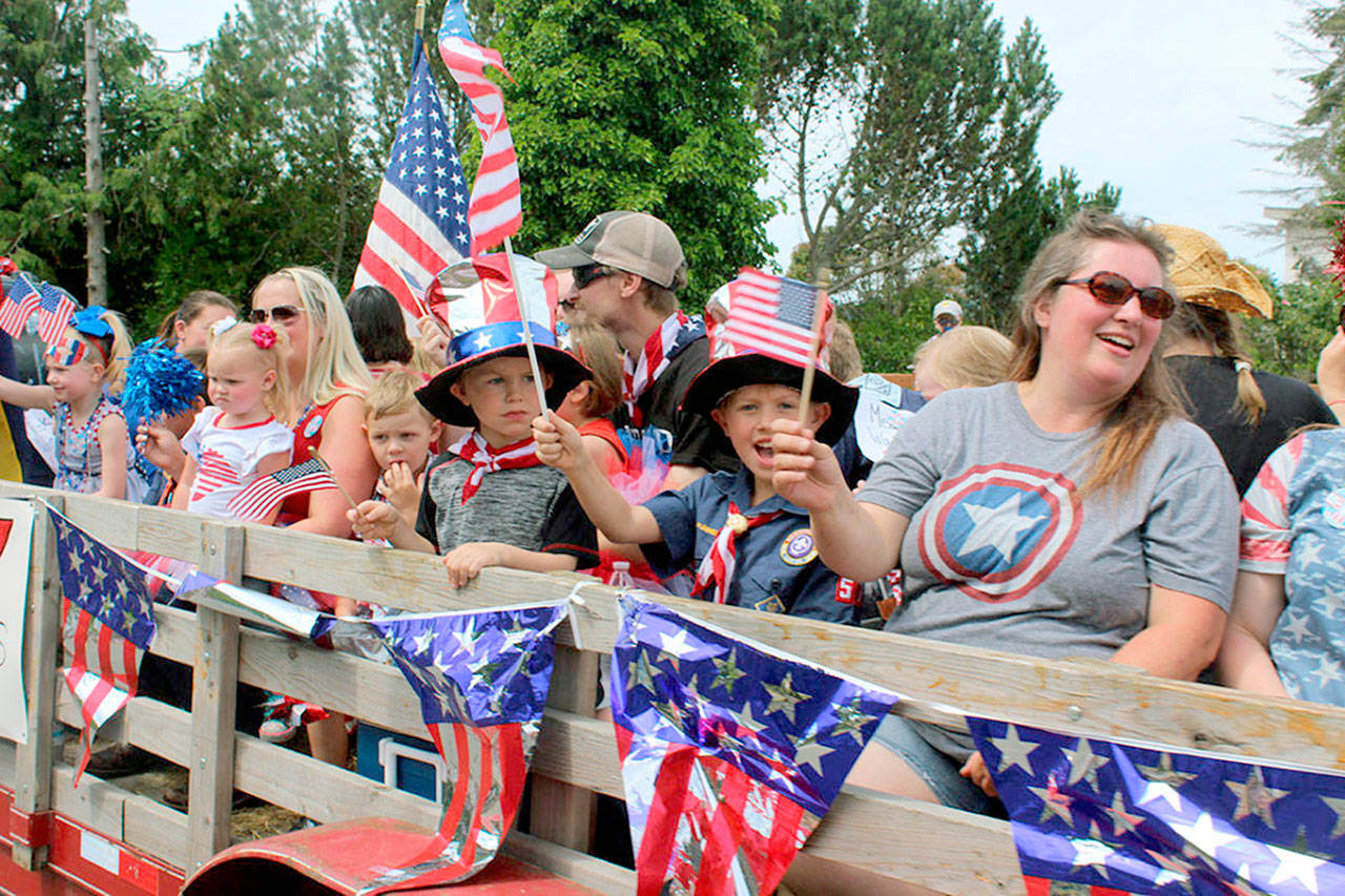 Local businesses have stepped up so the Maxwelton Independence Day parade on Whidbey Island can take place for the 104th time on July 4. (South Whidbey Record file)