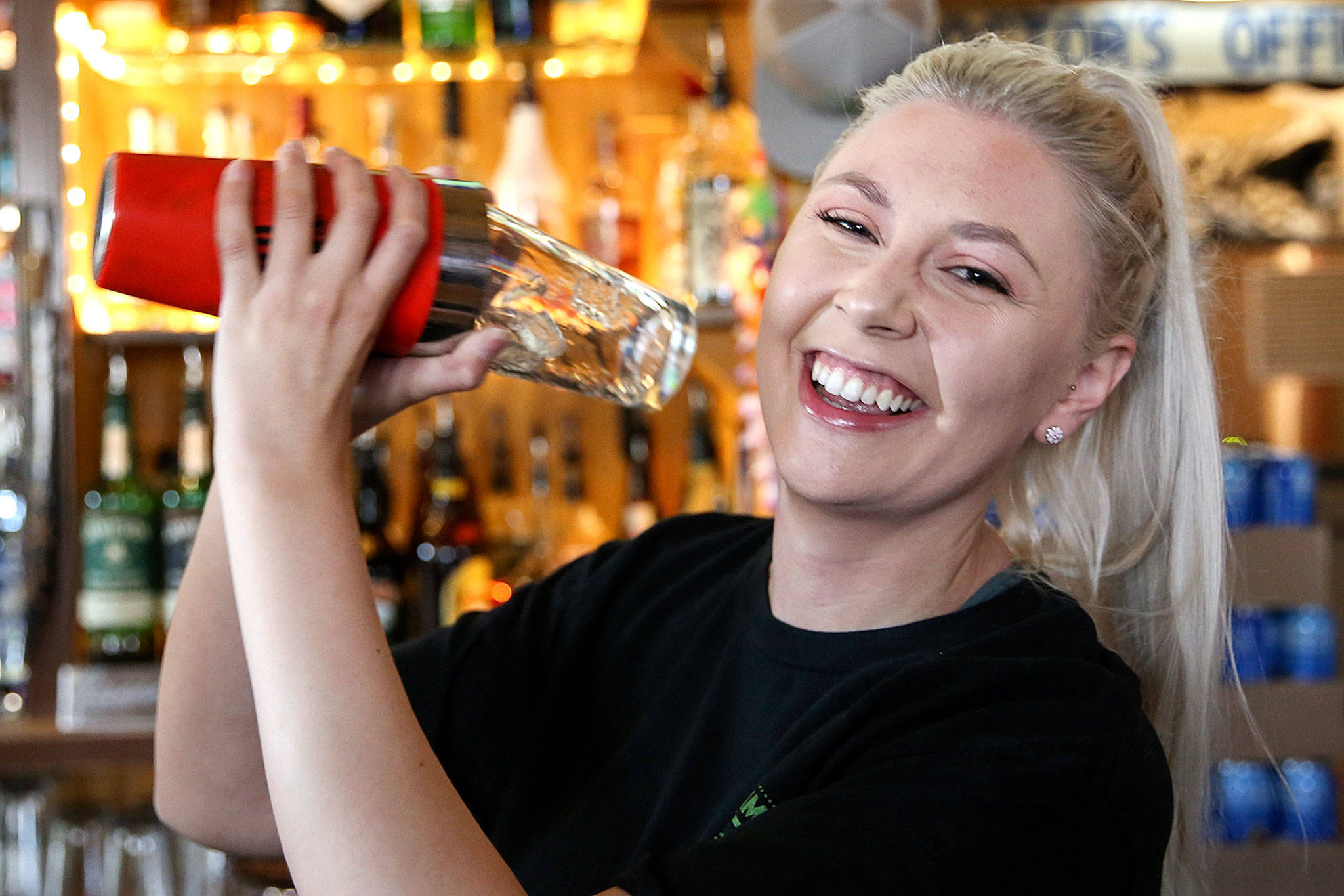 Jessie Meyers, a bartender at Twisted Lime Pub in Mill Creek, would make J.K. Rowling an old fashioned if she had the chance. (Kevin Clark / The Herald)