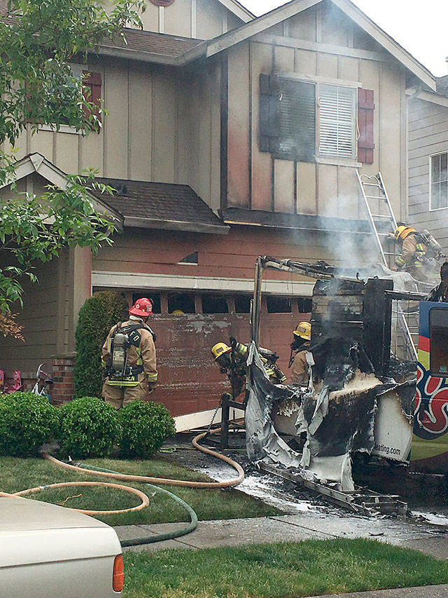 A fire that started from a box truck in a driveway extended to the exterior of a home in the 16000 block of 35th Park SE on Monday near Mill Creek. (Snohomish County Fire 7)