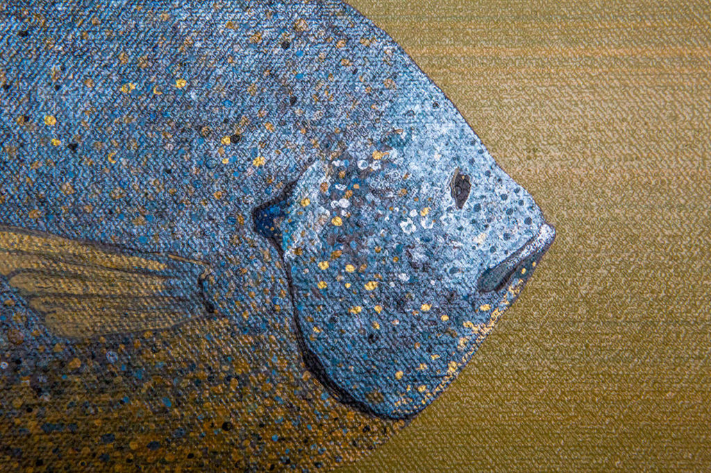 Paint used for Knutson’s painting, “Bluegill in the Vineyard,” shines in the light. (Olivia Vanni / The Herald)
