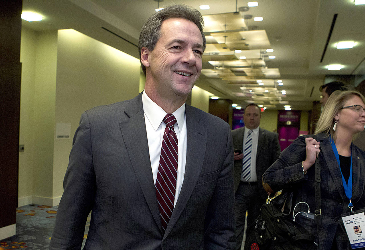 In this Feb. 23 photo, Montana Gov. Steve Bullock walks to a meeting during the National Governors Association 2019 winter meeting in Washington. (AP Photo/Jose Luis Magana, File)