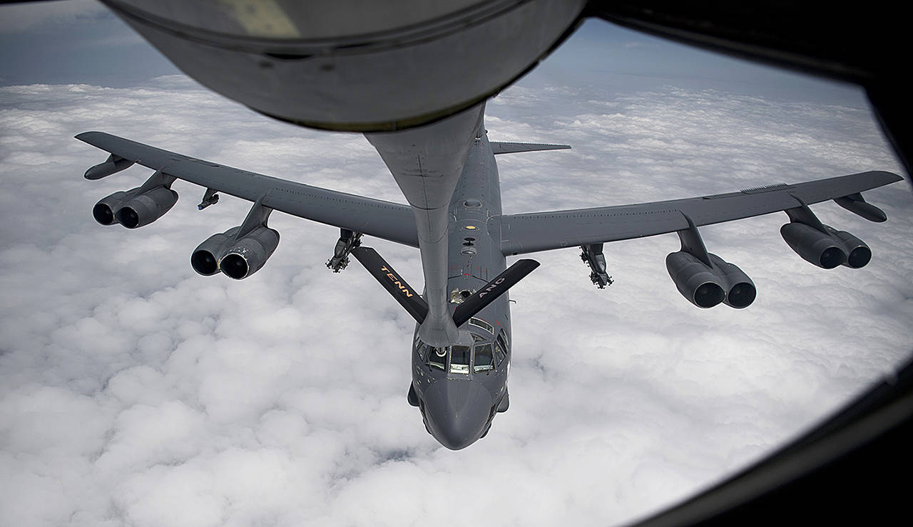 In this May 12 photo, a B-52H Stratofortress aircraft assigned to the 20th Expeditionary Bomb Squadron receives fuel from a KC-135 Stratotanker from the 28th Expeditionary Aerial Refueling Squadron, at an undisclosed location in Southwest Asia. The White House ordered the USS Abraham Lincoln aircraft carrier strike group and B-52 bombers to the Persian Gulf region on May 4. (Senior Airman Keifer Bowes, U.S. Air Force via AP)