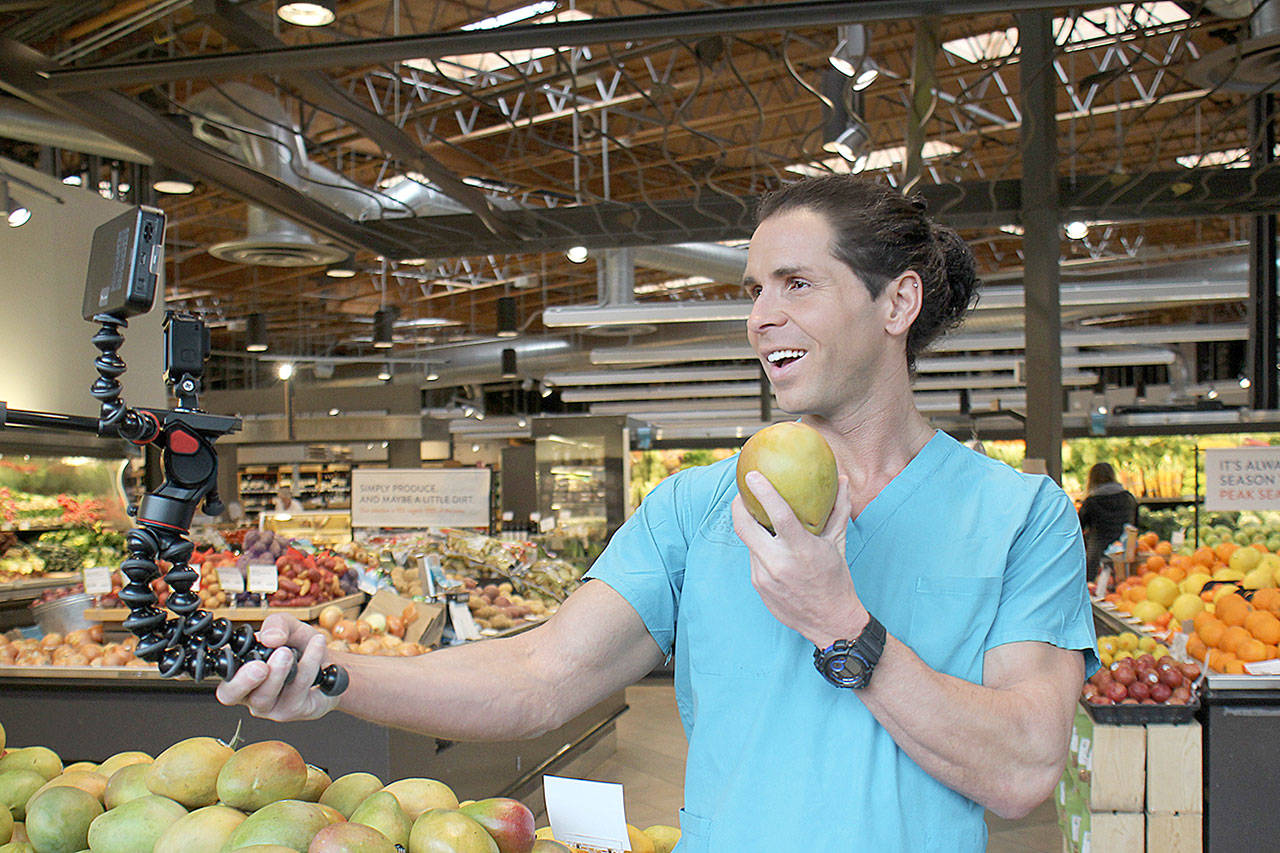 Stefan Torres, 33, known as Nurse Stefan in social media circles, works on a nutrition video at a supermarket. (Submitted photo)