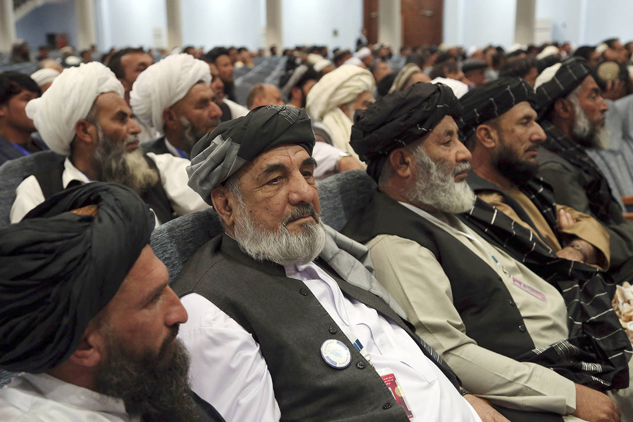 Delegates attend the fourth day of the Afghan Loya Jirga meeting in Kabul, Afghanistan on May 2. (AP Photo/Rahmat Gul)